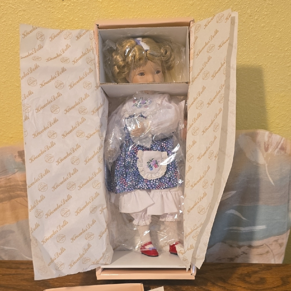 Precious Moments Blue and Red Collector's Figurine